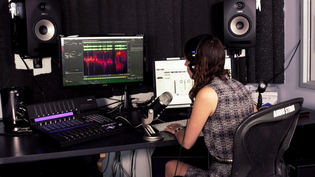 Student mixing music in the Audio Studio