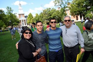Blue Jay Family posing in front of Gilman Hall