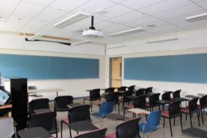 View of an empty classroom showcasing the individual student seating.