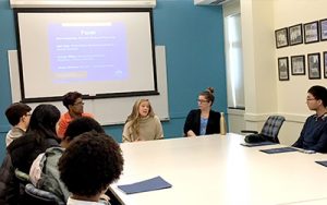 Students listen to a panel discussion during the Second-Year Summit.