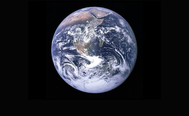 NASA's Apollo 17 full-color photograph of earth, showing the black background of space and the African continent.