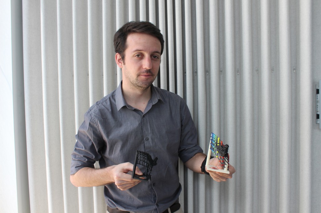 Frederic Vogt hold 3d prints of galaxy graphs