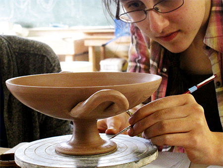 Anna Soifer working on pottery