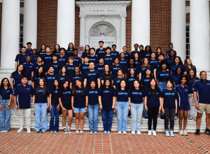 Hop-In cohort group picture in front of Gilman hall. All students are wearing matching light blue t-shirts