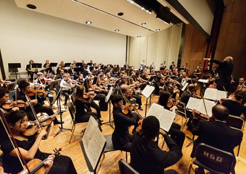 Photograph of orchestra on stage