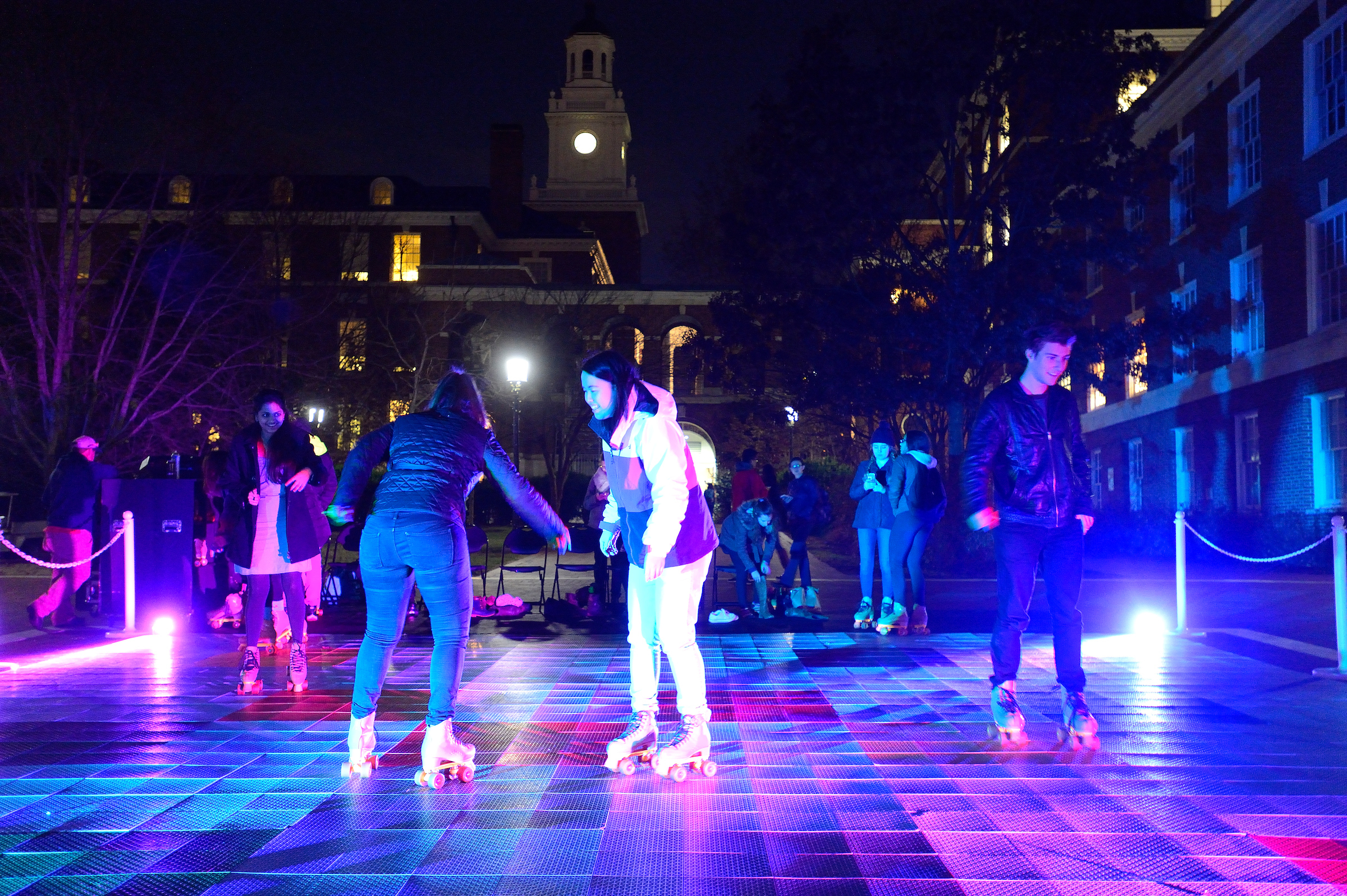 A photo of students roller skating on Levering Courtyard.