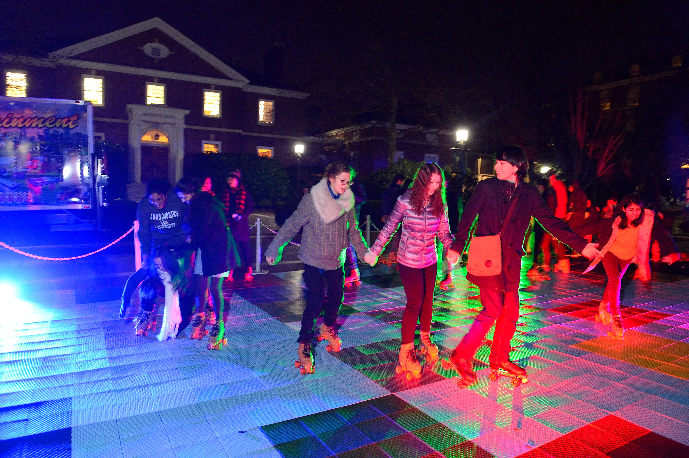 A photo of students roller skating on Levering Courtyard.