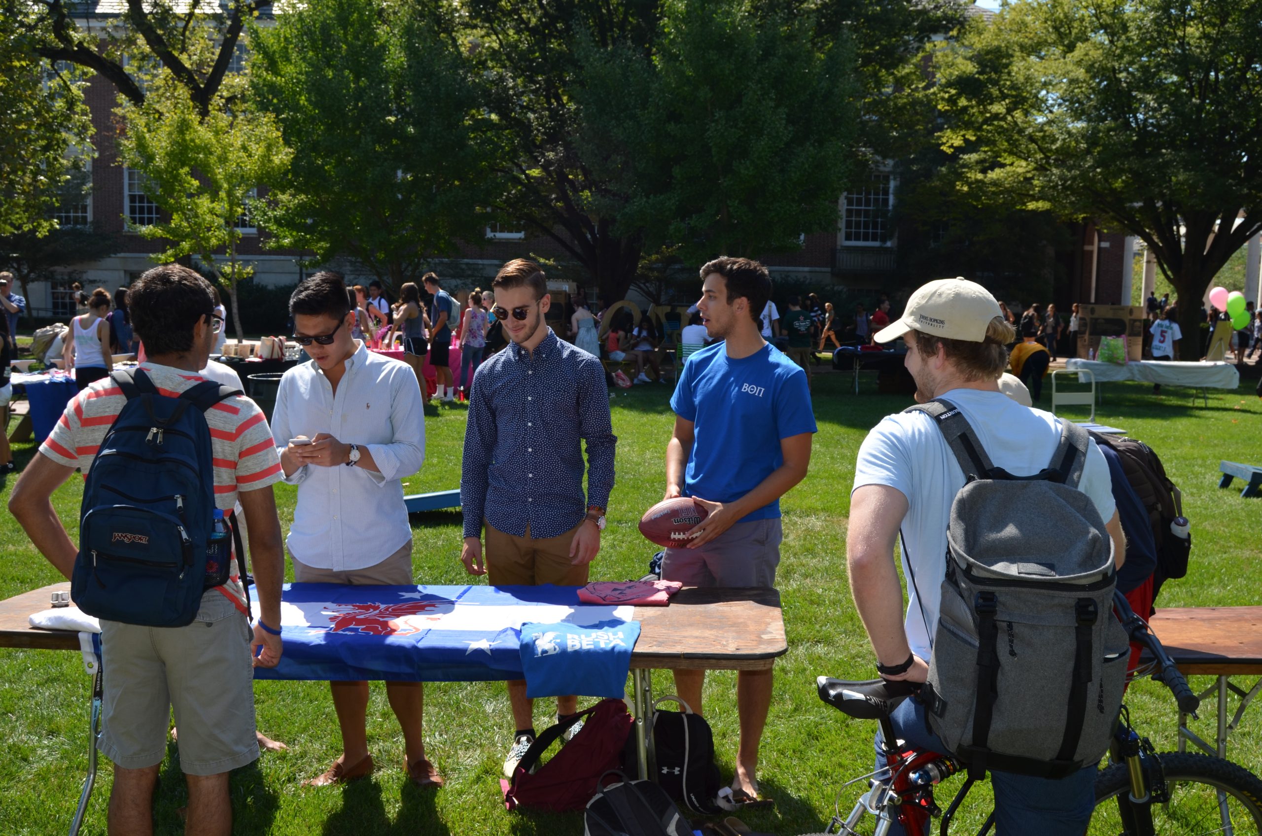 Brothers attending a fraternity recruitment event