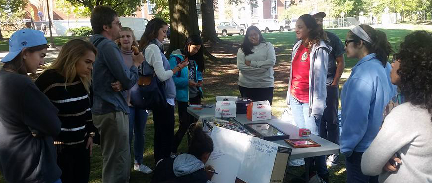 Students staffing a booth on campus
