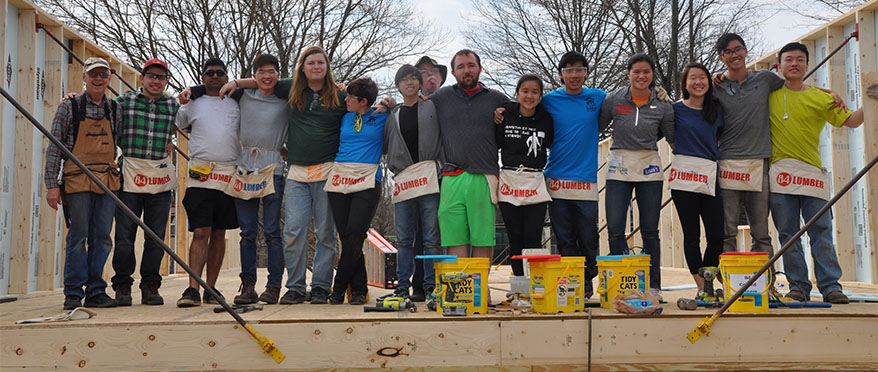 picture of Habitat for Humanity JHU students building a house