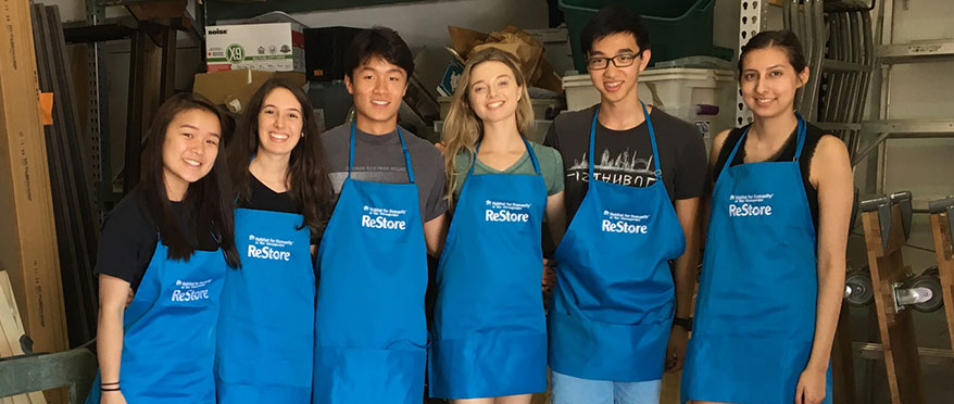 picture of JHU habitat preo students at a restore project