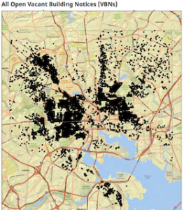Map with black dots representing vacants in Baltimore City