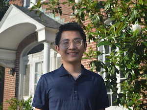 Photo of Ethan Wang, smiling