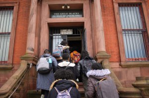 Students entering the Great Blacks in Wax Museum