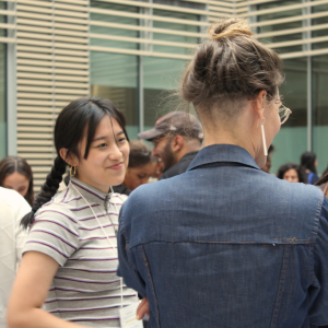 Jennifer Li smiling while talking to Community Partners. Concluding CIIP orientation