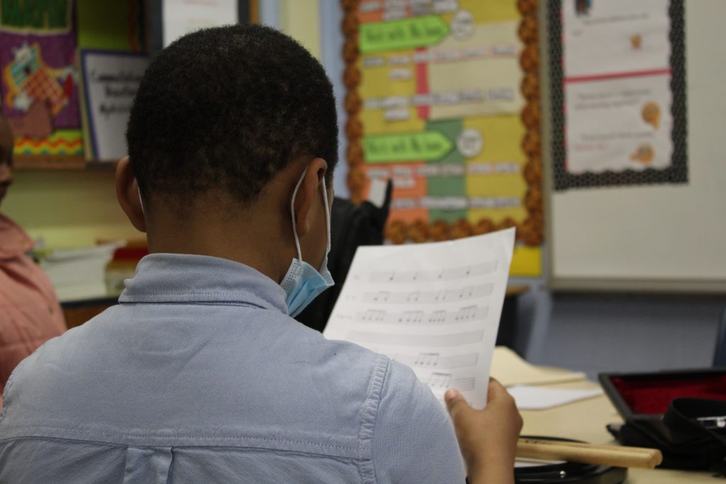 (Unedited) Student looking at music sheet