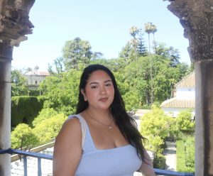 Angela Gutierrez infront of greenery background