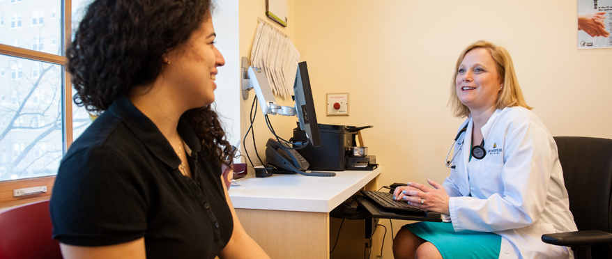 A student speaks with a medical provider in the Student Health and Wellness Center