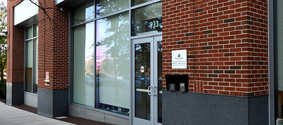 A photo of the exterior of the University Health Services main entrance