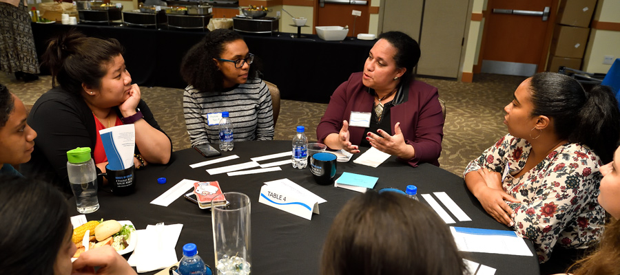 Students participating in a roundtable discussion